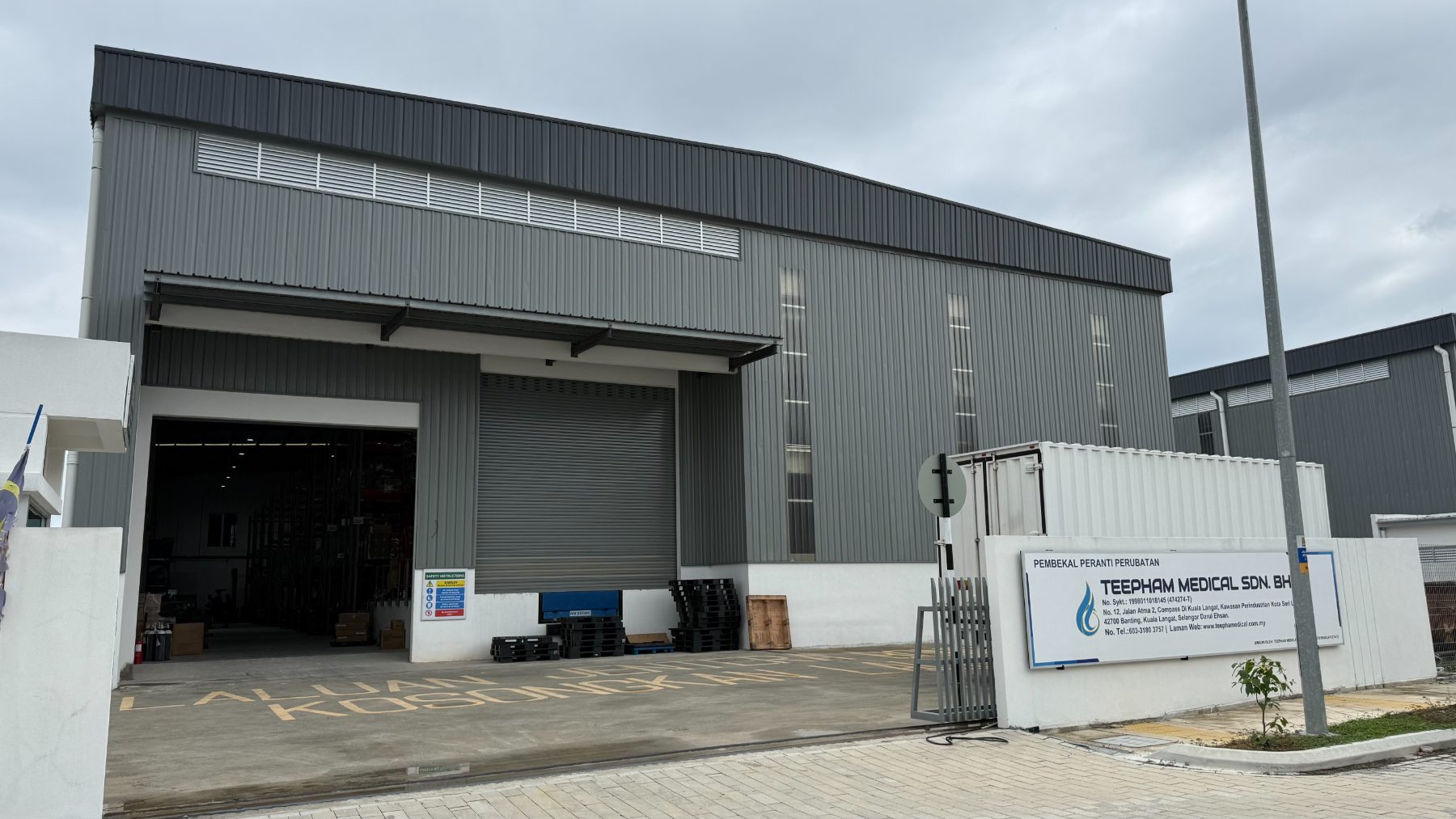 Teepham Medical's Selangor warehouse with the despatch bay open and pallets ready for loading